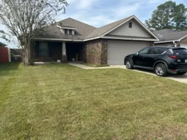 Beautifully maintained lawn in front of a house